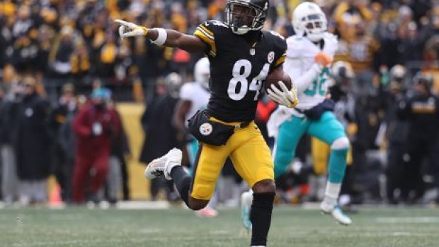 Antonio Brown points to the Miami Dolphins' bench en route to his second touchdown of the game.