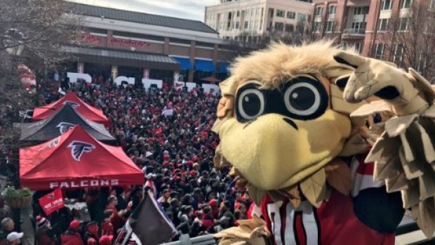 Atlanta Falcons Mascot Freddie Falcon sends the team to Houston with thousands of fans