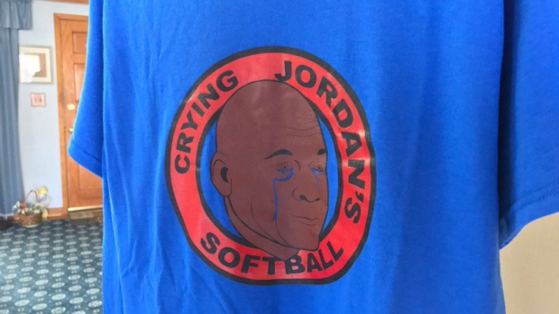 A softball team has designed a creative 'Crying Jordan Face' jersey.