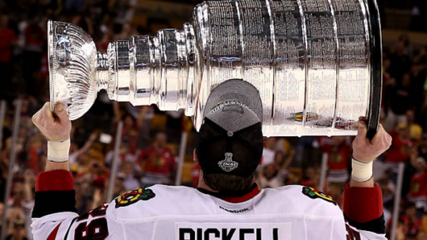 Bryan Bickell hoists the Stanley Cup after an impressive 2013 postseason.