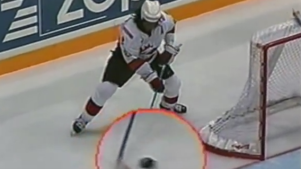 Anson Carter scores the golden goal to defeat Sweden in the 2003 IIHF World Championship final. 