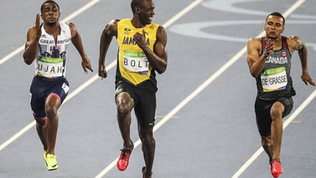 Usian Bolt and Andre De Grasse compete in the Men's 100 M semi-final at the 2016 Summer Olympics.