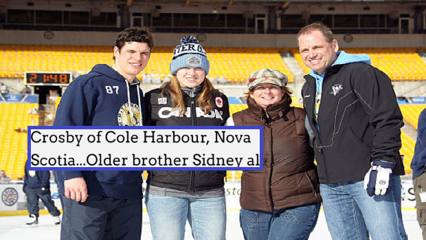 Sidney Crosby poses for a photo with his father Troy, mother Trina and sister Taylor.