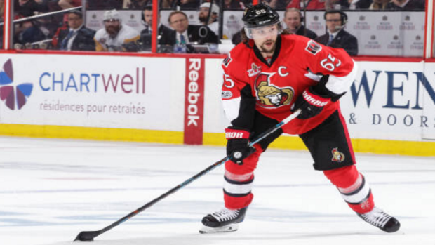  Erik Karlsson of the Ottawa Senators skates with puck against the Pittsburgh Penguins.