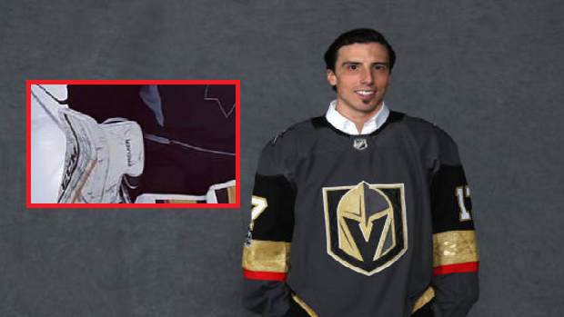 Marc-Andre Fleury rocks his new Las Vegas Golden Knights pads while wearing an inside out Pens tarp.