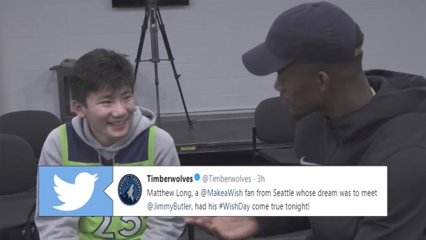 Jimmy Butler and young fan