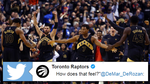 DeMar DeRozan celebrates with Toronto Raptors teammates.