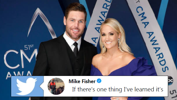 Mike Fisher poses for a photo with his wife Carrie Underwood.
