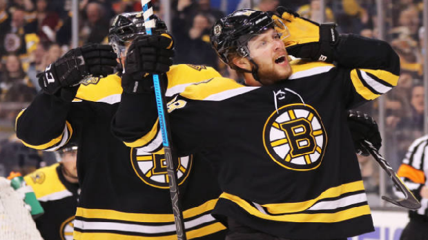 David Pastrnak celebrates scoring for the Boston Bruins.