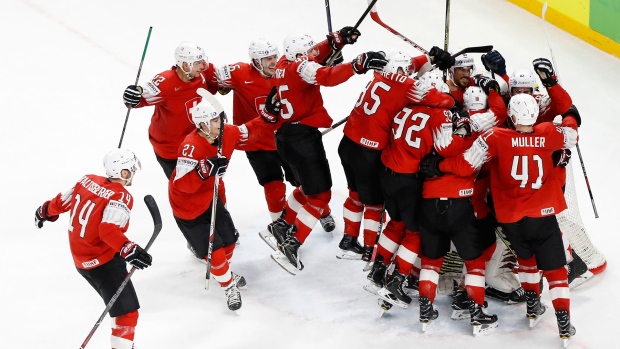 Swiss defeat Canada