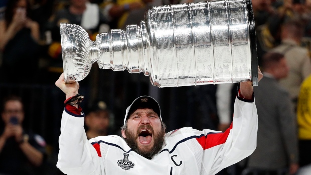 Alex Ovechkin and his parents take the Cup to the grave of his