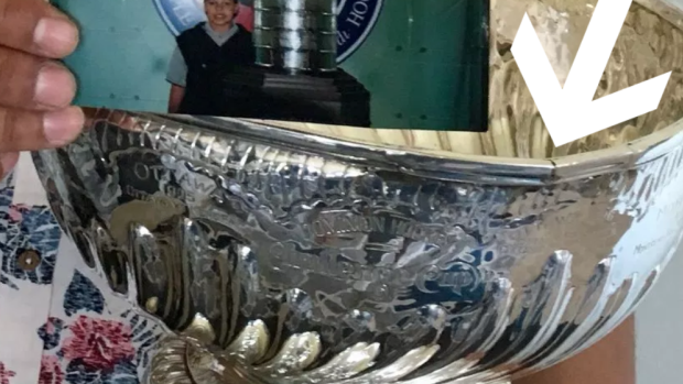 This picture shows some damage done to the Stanley Cup by the