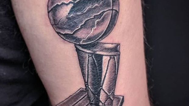 Another Raptors tattoo has emerged, this one of a "Raptorized" Larry O