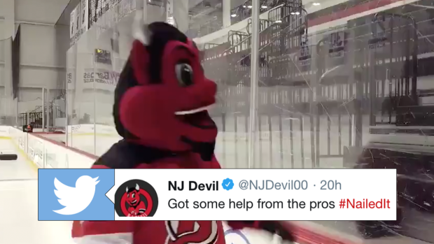 new jersey devils mascot breaks glass