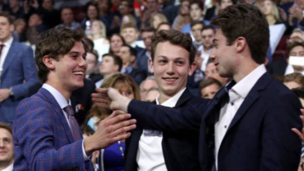 Quinn Hughes thinks long layoff will help development of brother Jack