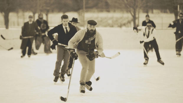 Players skating during 'WRG Classic' action. 