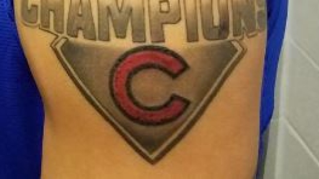 Javier Baez's shows off his new World Series Tattoo.