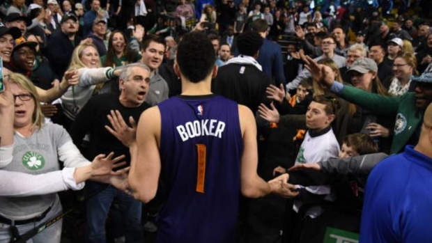 Devin Booker posted a career-high 70 points in the Phoenix Suns' 130-120 loss to the Boston Celtics.
