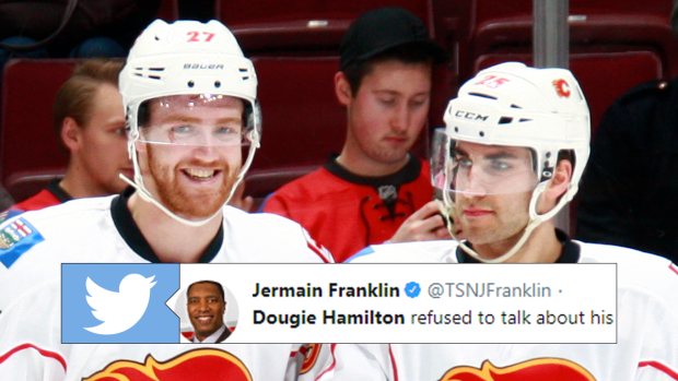 Hockey fans debate who slammed Calgary Flames player Dougie Hamilton on hot  mic